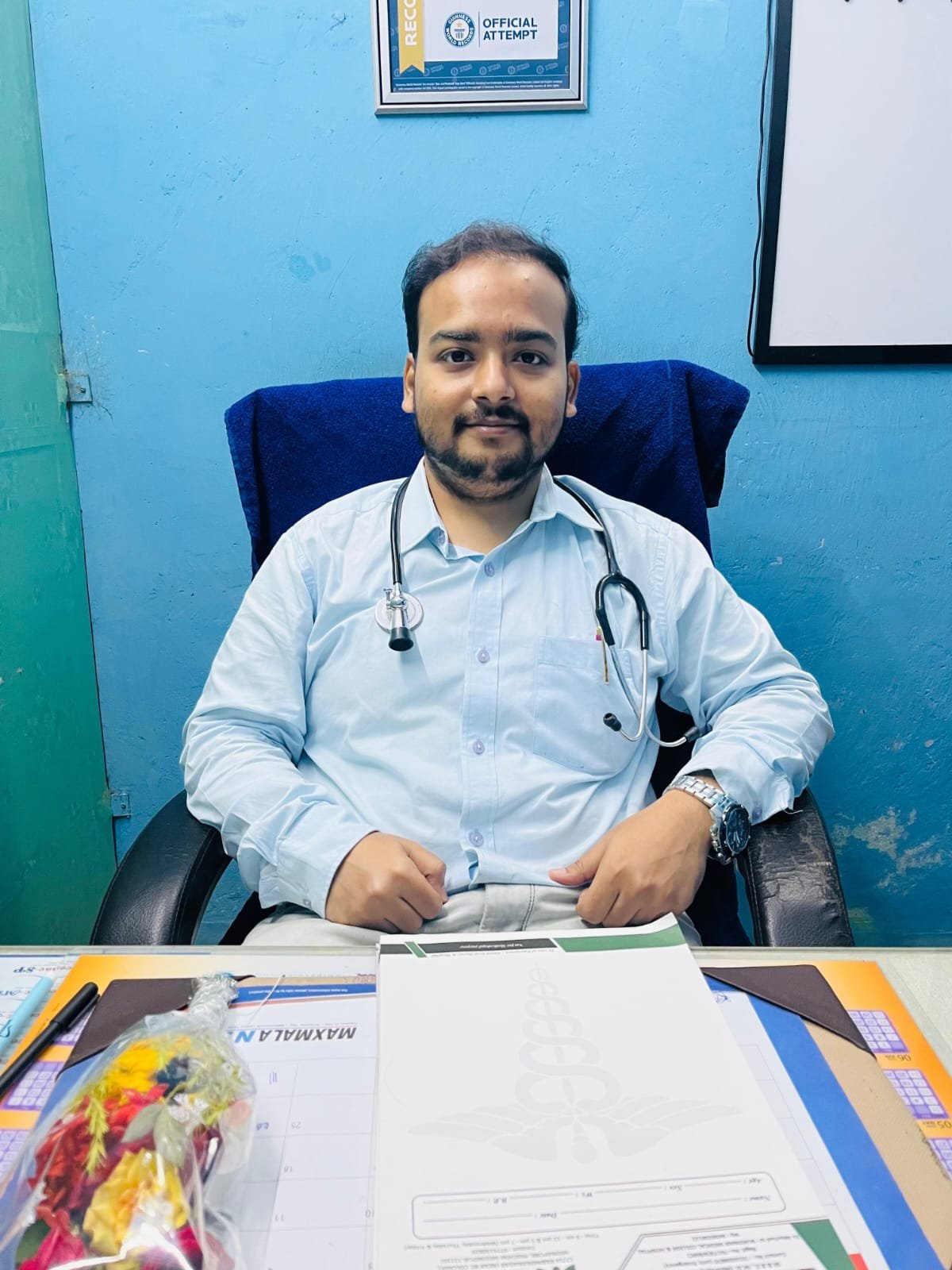 Dr. Sandip Dutta consulting a patient at Evergreen Diagnostic Centre