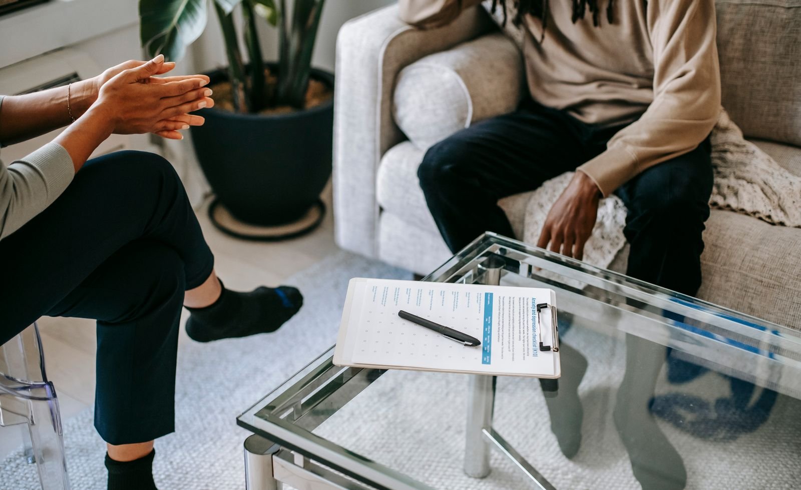 Supportive counseling conversation between therapist and patient in a calm setting